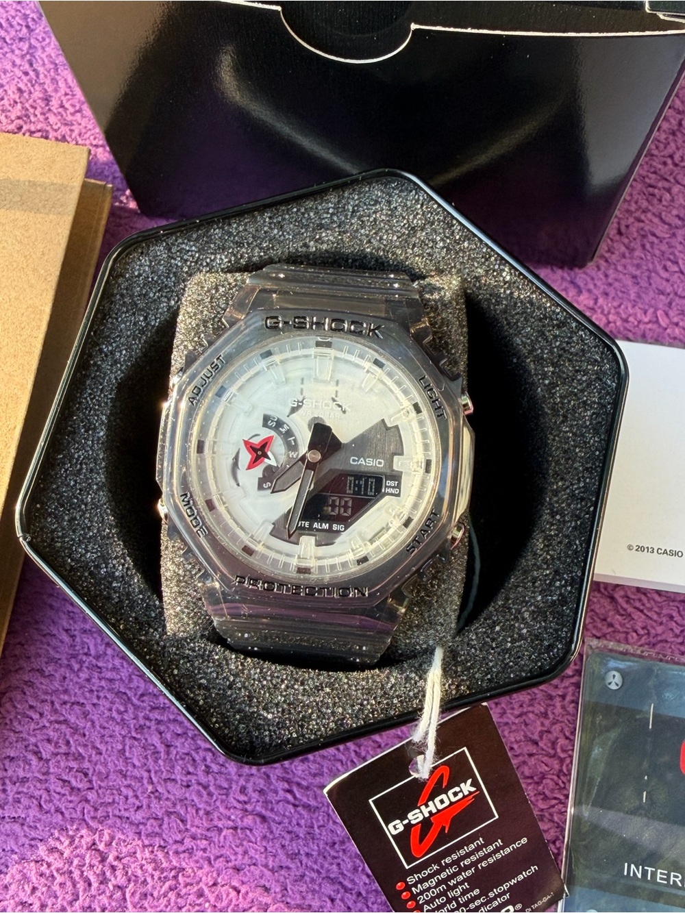 Casio G-Shock Translucent Smoke Watch with White Dial and Black Accents